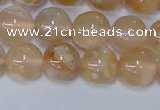 CAA1073 15.5 inches 10mm round sakura agate gemstone beads