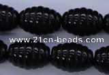 CAG1693 15.5 inches 15*20mm carved rice black agate beads