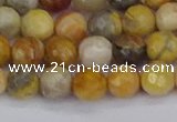 CAG9869 15.5 inches 6mm faceted round yellow crazy lace agate beads
