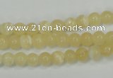 CCA201 15.5 inches 6mm round yellow lace calcite beads
