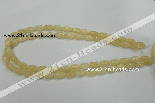 CCA208 15.5 inches 8*12mm rice yellow lace calcite beads