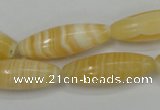 CCA209 15.5 inches 10*30mm rice yellow lace calcite beads