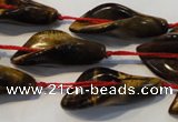 CFG566 15.5 inches 14*28mm carved trumpet flower yellow tiger eye beads