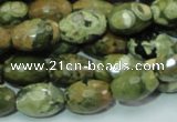 CRH68 15.5 inches 10*15mm faceted rice rhyolite beads wholesale