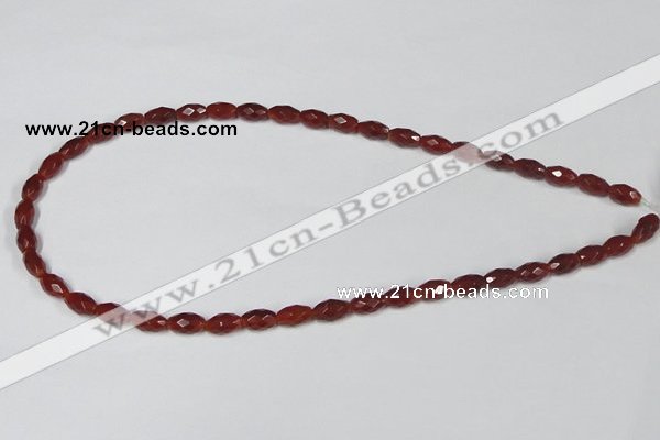 CAA124 15.5 inches 6*10mm faceted rice red agate gemstone beads