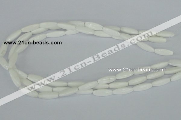 CAA22 15.5 inches 7*20mm faceted rice white agate gemstone beads