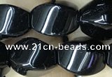 CAA2486 15.5 inches 10*14mm twisted rice black agate beads