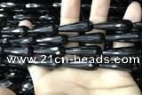 CAA2520 15.5 inches 10*30mm faceted teardrop black agate beads