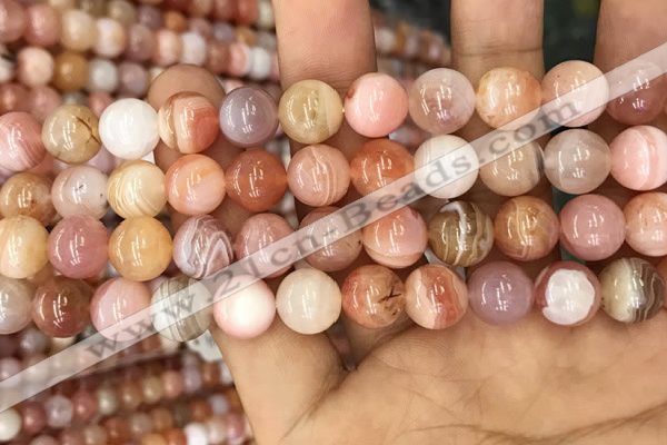 CAA3534 15.5 inches 10mm round pink botswana agate beads