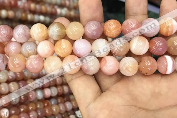 CAA3535 15.5 inches 12mm round pink botswana agate beads