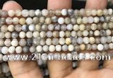 CAA3586 15.5 inches 4mm round matte ocean fossil agate beads