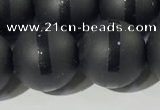 CAA3653 15.5 inches 12mm round matte & carved black agate beads