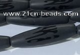 CAA3681 15.5 inches 8*30mm rice matte & carved black agate beads