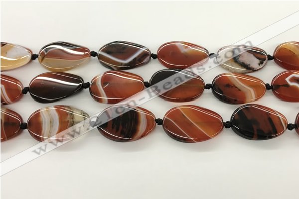 CAA4301 15.5 inches 25*30mm twisted oval line agate beads