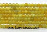 CAA6276 15 inches 4mm round yellow fire agate beads