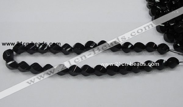 CAB336 15.5 inches 10*14mm faceted & twisted rice black agate beads