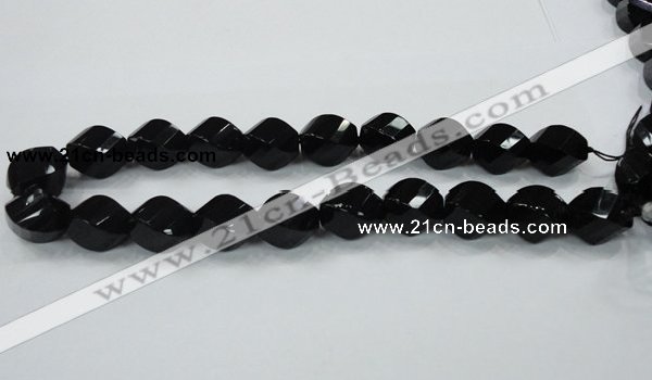 CAB337 15.5 inches 15*20mm faceted & twisted rice black agate beads