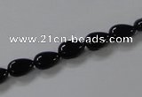 CAB744 15.5 inches 6*8mm flat teardrop black agate gemstone beads