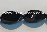 CAB797 15.5 inches 12*24mm faceted & twisted rice black agate beads