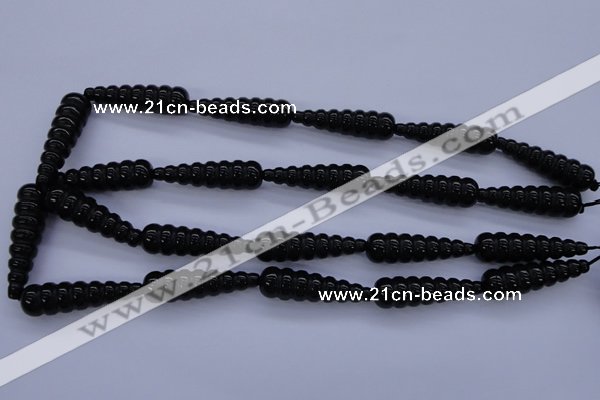 CAG1697 15.5 inches 10*35mm carved teardrop black agate beads