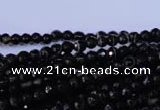 CAG2312 15.5 inches 4mm faceted round black line agate beads