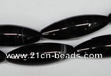 CAG2969 15.5 inches 10*30mm rice black line agate beads