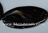 CAG3015 15.5 inches 25*50mm twisted oval black line agate beads