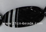 CAG3086 15.5 inches 25*50mm faceted oval black line agate beads