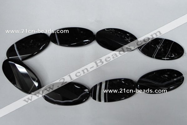 CAG3086 15.5 inches 25*50mm faceted oval black line agate beads