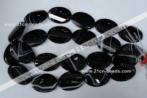 CAG3087 15.5 inches 25*35mm faceted oval black line agate beads