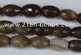 CAG3129 15.5 inches 10*14mm faceted rice brown line agate beads