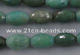 CAG3918 15.5 inches 6*10mm faceted rice green grass agate beads