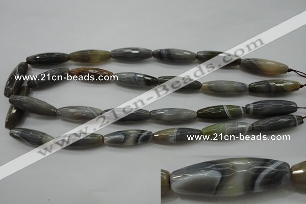 CAG3958 15.5 inches 10*30mm faceted rice grey botswana agate beads