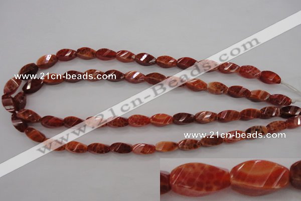 CAG4181 15.5 inches 7*14mm faceted & twisted rice natural fire agate beads