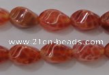 CAG4184 15.5 inches 6*10mm twisted rice natural fire agate beads