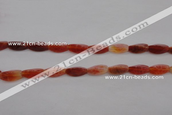 CAG4201 7*14mm faceted & twisted trihedron natural fire agate beads