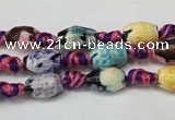 CAG5770 15 inches 6*9mm faceted rice fire crackle agate beads