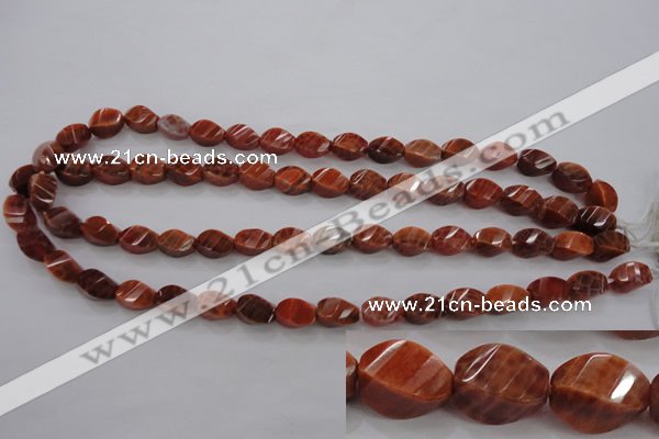 CAG581 15.5 inches 8*12mm faceted & twisted rice natural fire agate beads