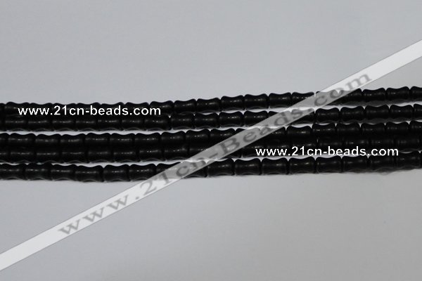 CAG6038 15.5 inches 4*8mm bone matte black agate beads