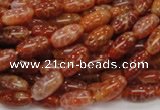 CAG604 15.5 inches 6*12mm rice natural fire agate beads wholesale