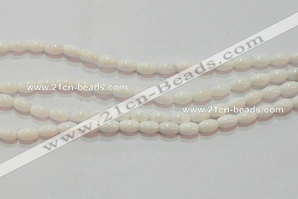 CAG7201 15.5 inches 6*9mm rice white agate gemstone beads