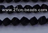 CAG9351 15.5 inches 6mm faceted nuggets black agate beads