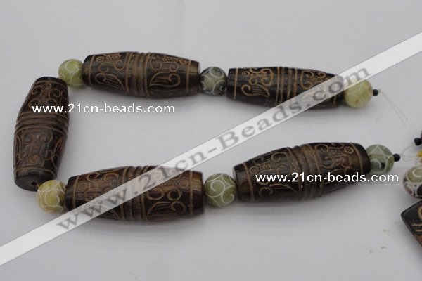 CAL05 14.5 inches 25*60mm carved drum agalmatolite beads