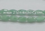 CBJ12 15.5 inches 6*10mm faceted rice jade beads wholesale