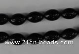 CBS201 15.5 inches 8*12mm rice blackstone beads wholesale