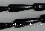 CBS218 15.5 inches 10*30mm faceted teardrop blackstone beads wholesale