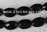 CBS310 15.5 inches 10*14mm faceted oval blackstone beads wholesale