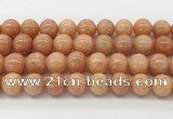 CCA517 15.5 inches 12mm round peach calcite gemstone beads