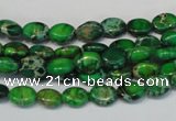 CDE178 15.5 inches 6*8mm oval dyed sea sediment jasper beads