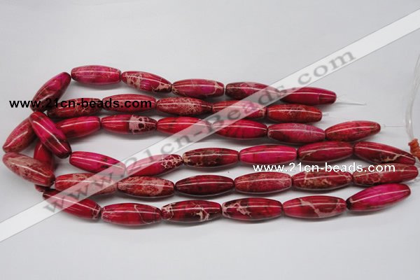 CDI607 15.5 inches 11*31mm rice dyed imperial jasper beads